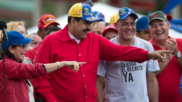 Venezuela's President Nicolas Maduro, second from left, and Caracas mayor Jorge Rodriguez, second from right, during an anti-imperialist rally in Caracas in March.