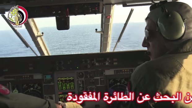 An Egyptian plane searches in the Mediterranean Sea for crashed EgyptAir flight 804.