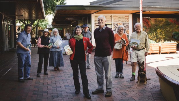 It's been one year since the ACAT tribunal retired to consider their appeal against the redevelopment of a Dickson car park into a Coles supermarket and apartment complex. Front, Jane Goffman and Ron Brent. Behind, Denis O'Brien, Jacqui Pinkava, Rosemary Urquhart, Paul Costagan, Robin d'Arcy, and John Carroll. 