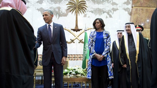 To shake or not to shake hands: US President Barack Obama and headscarf-less first lady Michelle Obama participate in a delegation receiving line with new Saudi Arabian King, Salman bin Abdulaziz in Riyadh.