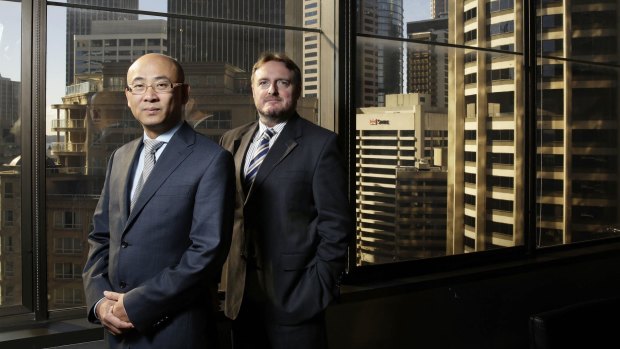 George Wang (left) and outgoing APP Securities chief executive Craig Mason.
