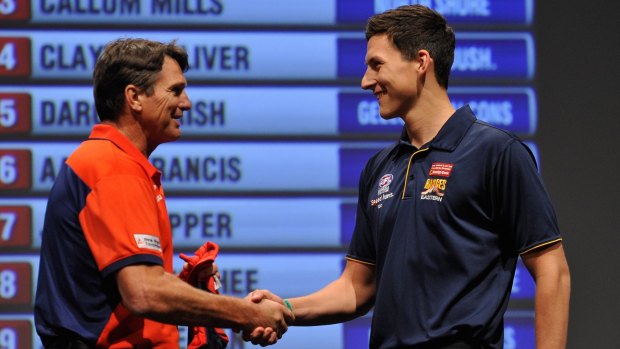 Weideman being welcomed to the club at last year's Draft by Paul Roos.