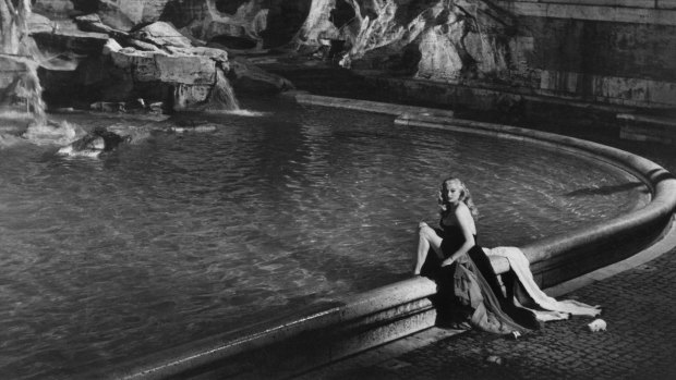 Anita Ekberg as Sylvia in 'La Dolce Vita', one of the director's most famous films.