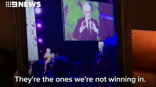 Malcolm Turnbull mimics the US President at the Midwinter Ball in Canberra.