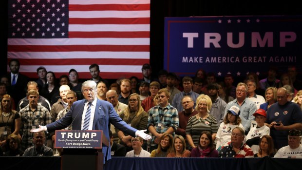 All about the flag: Donald Trump speaks during a rally in Iowa.