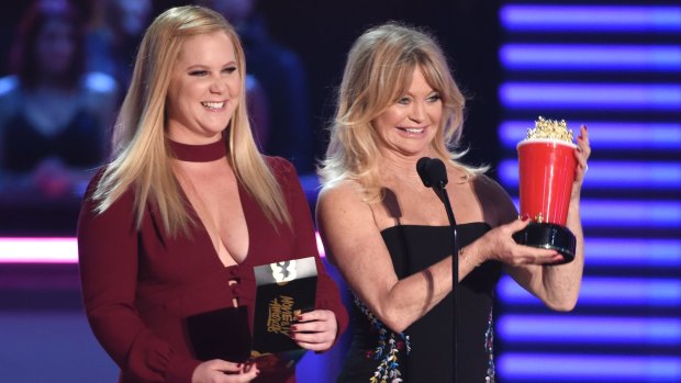 Amy Schumer and Goldie Hawn present the award for movie of the year.