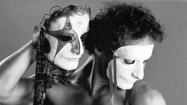 Murphy with masks created by Susan Rogers in 1983.