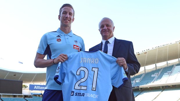 Building together: Marc Janko and Graham Arnold.