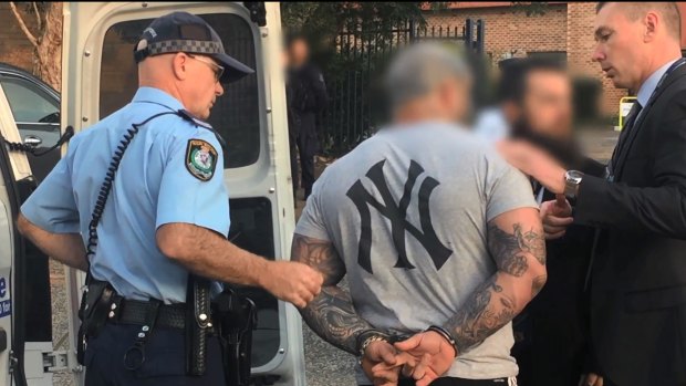 Two Finks members have been charged following a raid of a property at an industrial unit in North Wollongong. 
