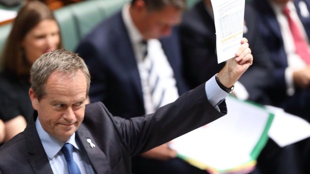Opposition Leader Bill Shorten has attacked the Abbott government's cuts to the ABC budget but won't say by how much he would restore the funding if elected Prime Minister.