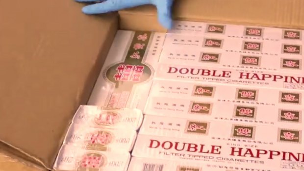 Part of a haul of 4.5 million cigarettes intercepted by Australian Border Force in a container from Malaysia declared as boxes of paper cups.