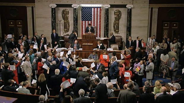 Rebellious Democrats stage an extraordinary all-day sit-in on the floor of the US Congress to demand votes on gun-control bills.