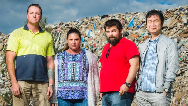 Damian Wade, Linda Galea, Daniel Ciccarone, and Stanley Chin from nearby business IC Formwork are unimpressed with the smelly pile of rubbish growing next to their workplace in Hume. 