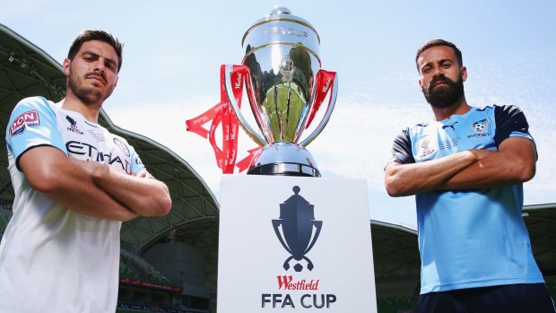 Bruno Fornaroli of City and Alex Brosque of Sydney FC with the FFA Cup.