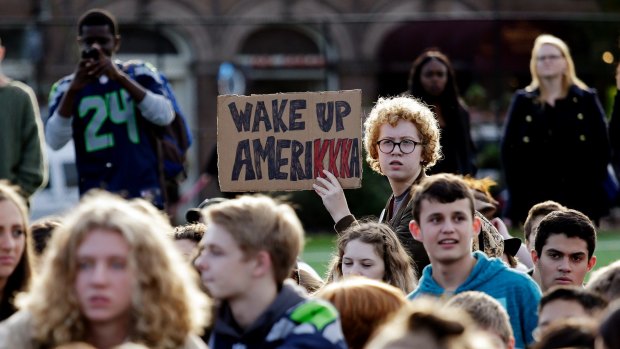 In Seattle, students walk out of class to protest against the election of Donald Trump.