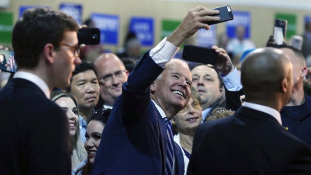 Former vice-president Joe Biden takes a selfie after addressing a gathering at campaign event for New Jersey Democratic gubernatorial candidate Phil Murphy last Sunday.