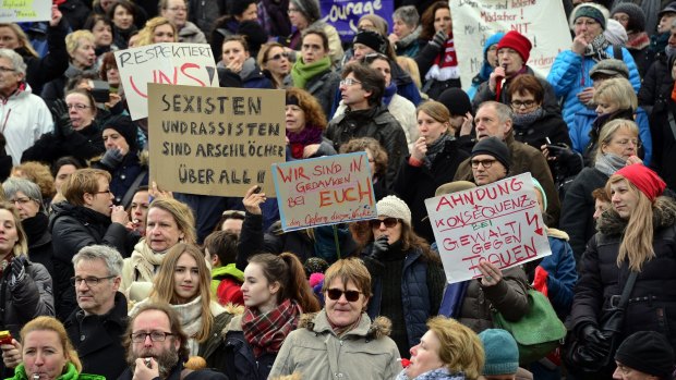 A flash mob gathers in front of Cologne's main railway station to protest against the New Year's Eve sex attacks. 