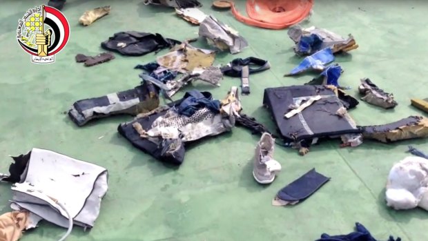 Debris and personal belongings from MS804, including a shoe, which were recovered from the sea.