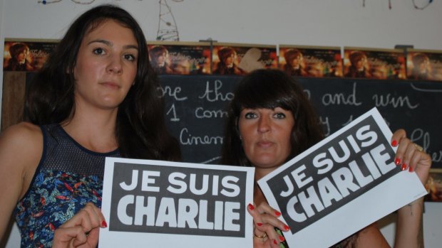 Le Forum workers Rozenn Sallic and Shirley Barroy says strangers have been walking in off the street with the message "je suis Charlie".