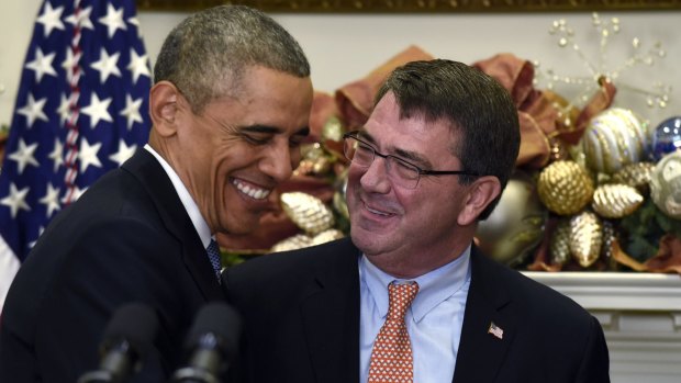 Hagel out, Carter in: US President Barack Obama shares a laugh with Ashton Carter, his nominee for Defence Secretary. Carter will be the fourth person in that post during Obama's presidency.
