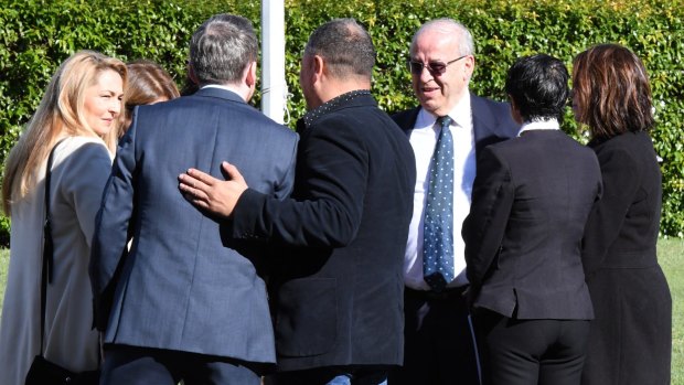 Eddie Obeid with members of his family and legal team during the trial.