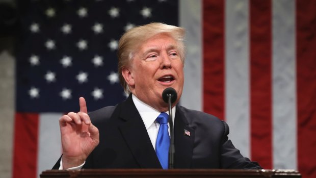 President Donald Trump delivers his first State of the Union address in the House chamber of the Capitol building