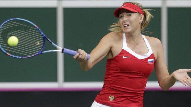 Red hurt: Injury has forced Maria Sharapova from the Brisbane International.