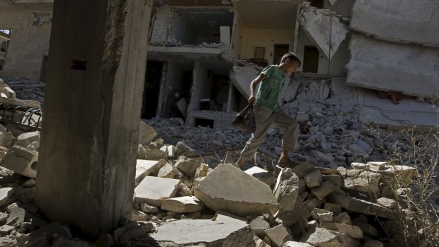 The remains of homes in the Idlib district of Syria, 60km from Aleppo. Reem and her family left Idlib, fearing for their safety. 