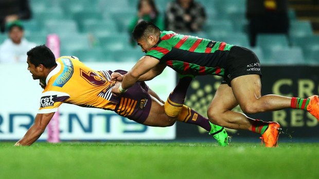 'Soft': Anthony Milford dives over for another try to the Broncos.