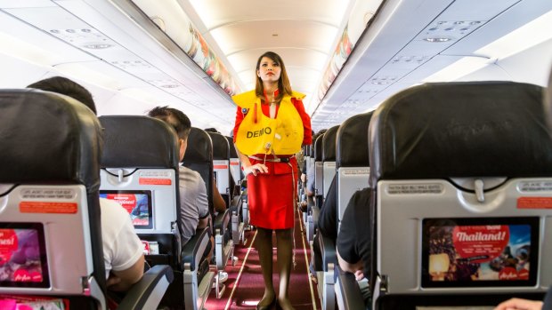 Should flight attendants force passengers to pay more attention during safety briefings?