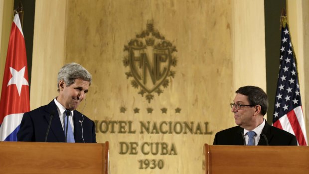 US Secretary of State John Kerry and Cuba's Foreign Minister Bruno Rodriguez at a joint news conference in Havana on Friday.