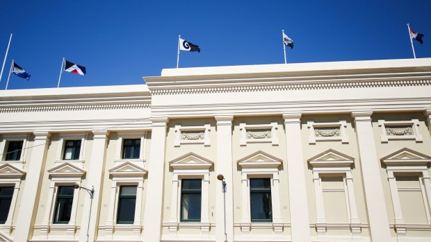 The final five flag designs fly on top of the Wellington Town Hall on October 12.