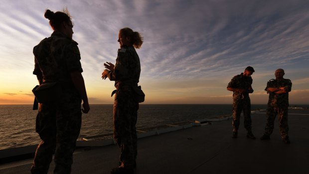 Sailors on the flight deck of the HMAS Canberra during the Royal Australian Navy exercises off Jervis Bay last November.
