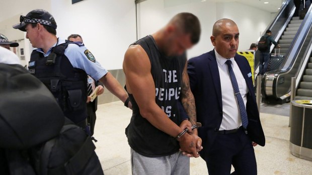 A 36-year-old man was arrested at Sydney Airport on Monday morning and charged over the December assault of another man.