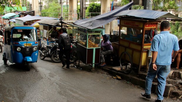 Jakarta street vendors - known as kaki lima - are a vital part of the Indonesian economy.