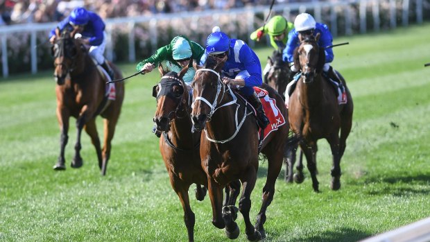 Super mare: Hugh Bowman rides Winx to victory in the Cox Plate ahead of Humidor in October.