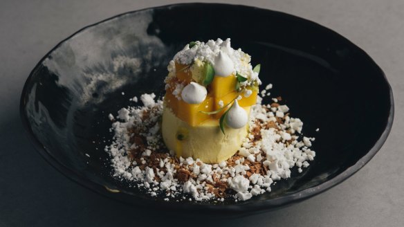 Mango mousse with coconut, passionfruit and white chocolate.