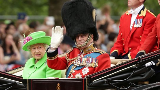 Queen Elizabeth and the Duke of Edinburgh makes their way  from Buckingham Palace for the Trooping the Colour ceremony last year.