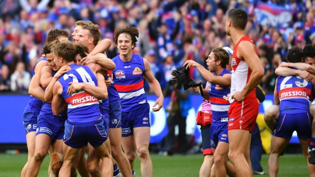 Many Bulldogs fans missed out on seeing their beloved club win its first flag in 60 years.