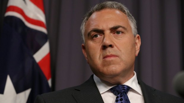Budget blowout: Treasurer Joe Hockey addresses the media during the release of the Mid-Year Economic and Fiscal OUtlook at Parliament House.