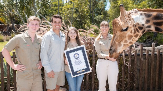 The Irwin family with the official Guinness World Record declaration for Forest (R). 