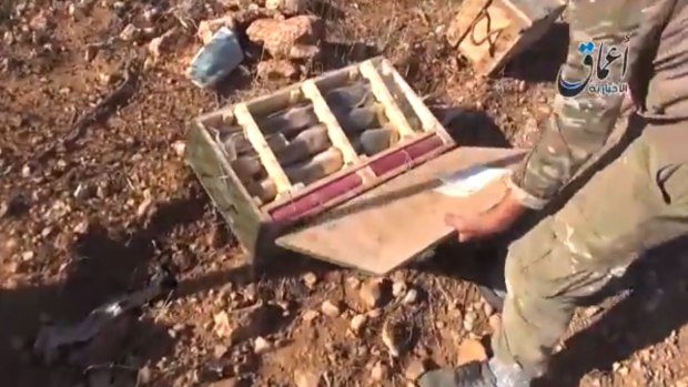 Captured: Video footage of an Islamic State group militant looking through the weapons cache appeared to be authentic.