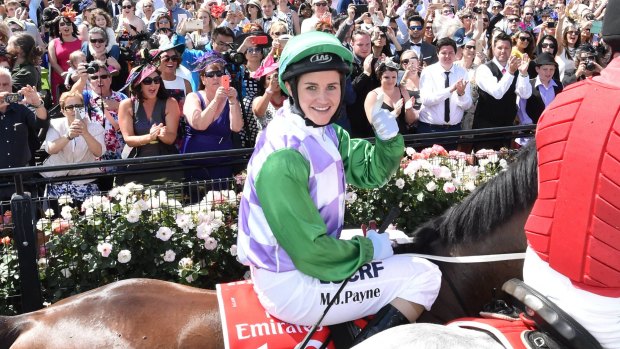 The push is on to remove 'Ms' from the form guide. Michelle Payne celebrates last year's Melbourne Cup, the first woman to win the race. 