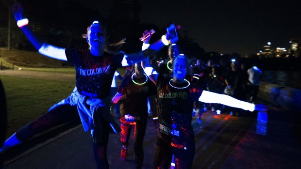 Night moves: participants make their way through The Color Run Night course.
