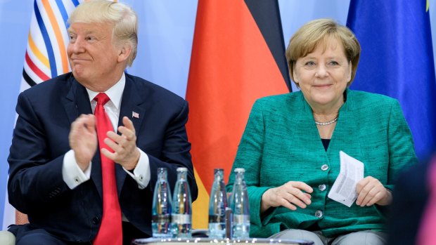 Donald Trump and German Chancellor Angela Merkel on the second day of the G20.