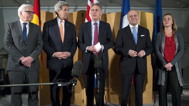 High-powered talks: British Foreign Secretary Philip Hammond (centre), flanked by German Foreign Minister Frank Walter Steinmeier, US Secretary of State John Kerry, French Foreign Minister Laurent Fabius and European Union High Representative Federica Mogherini, makes a statement following Iran nuclear negotiations last week.