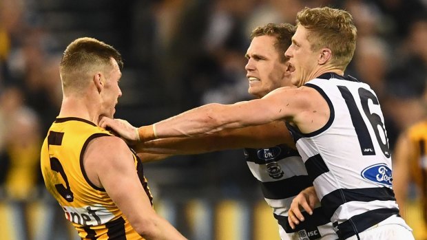 Brothers in arms: Joel and Scott Selwood confront Sam Mitchell.  