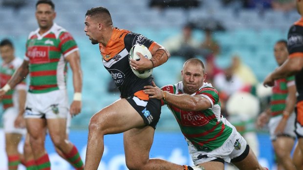 Midfield break: Josh Aloiai bends the South Sydney line.