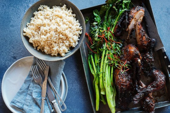 Twice-cook duck with charred Asian greens.