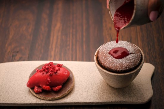 Valrhona souffle with raspberry sorbet.